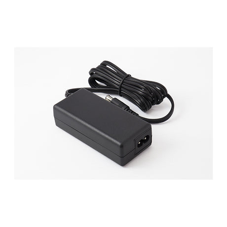 Adaptador de Voltaje Korg KA 380 vista oficial completa sobre fondo blanco