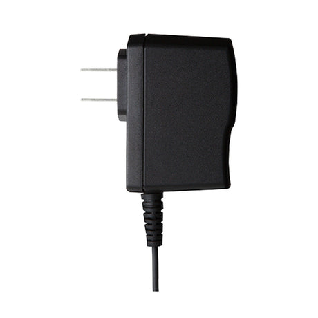Adaptador de corriente BOSS PSA-120S, vista lateral sobre fondo blanco