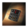 Preamplificador y afinador Cherub GT-6 instalado en guitarra acústica, vista frontal