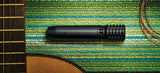 Shure PGA81 en uso con un instrumento