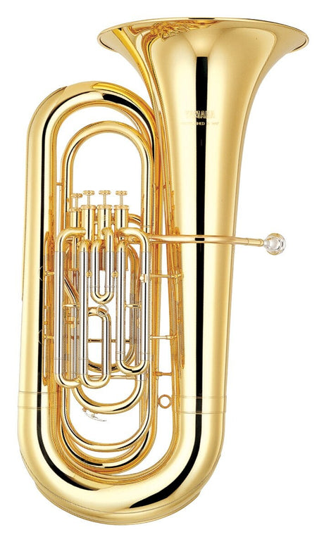 Tuba Yamaha YBB-321 dorada en Si bemol sobre fondo blanco